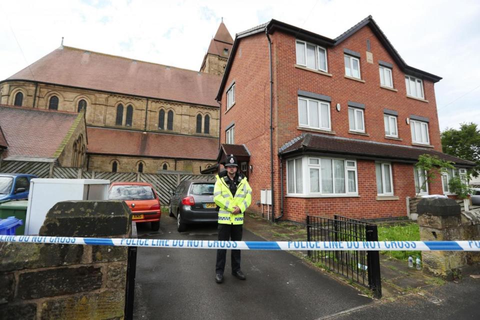 Raid: Arrests were also made in Brideoak Street, Cheetham Hill (PA)