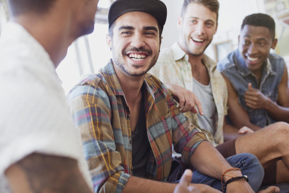 a group of guy friends laughing