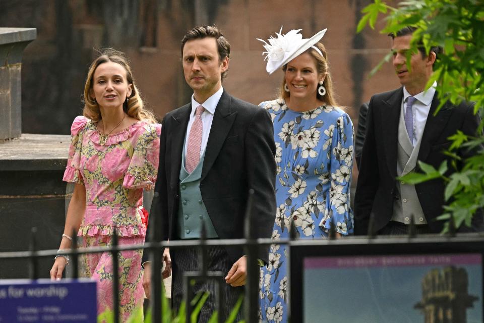 Charles van Straubenzee (L) and his wife Daisy Jenks (L) arrive to attend the wedding (AFP via Getty Images)