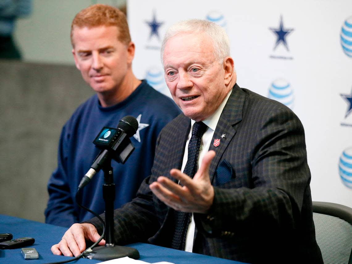 2015: Dallas Cowboys team owner Jerry Jones, front, responds to questions about head coach Jason Garrett’s, left, five year contract extension during a news conference.