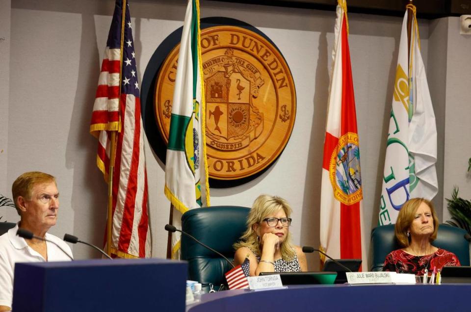 Dunedin Vice Mayor, John Tornga, left, Mayor Julie Ward Bujalski, center, and Commissioner Maureen “Moe” Freaney are seen during a city commission meeting Thursday, April 20, 2023.