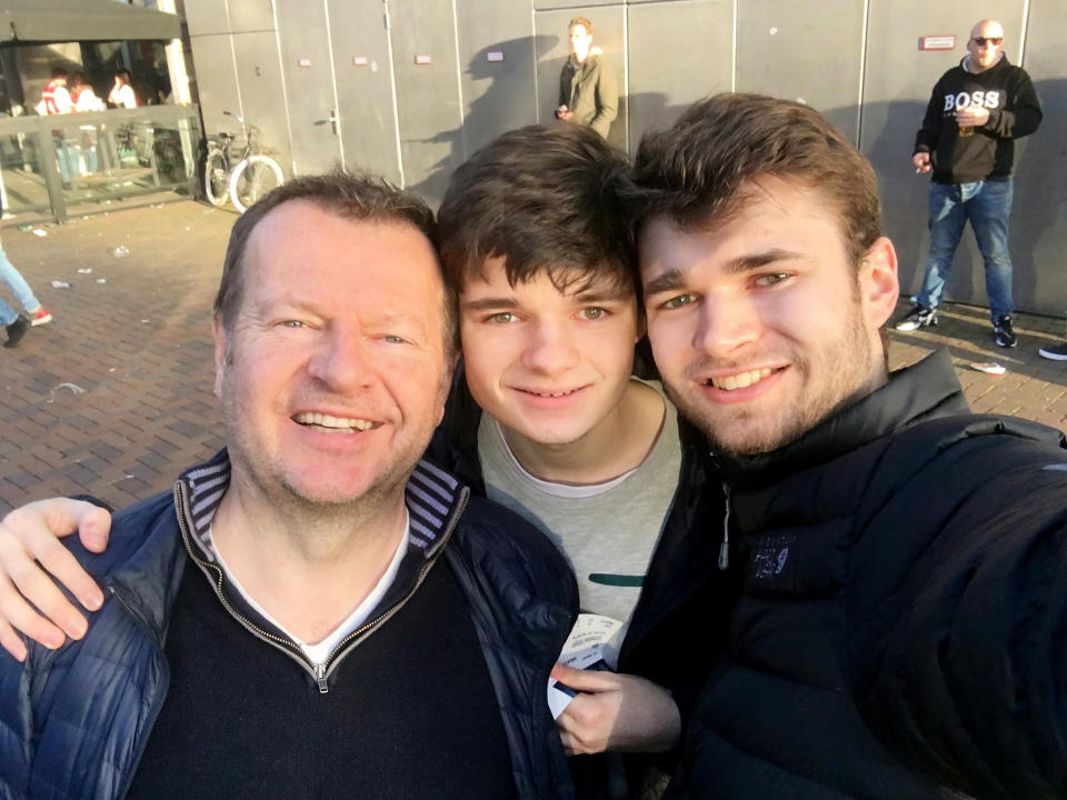 Michael (L), Will (C) and James (R) Perkins outside the stadium (SWNS)