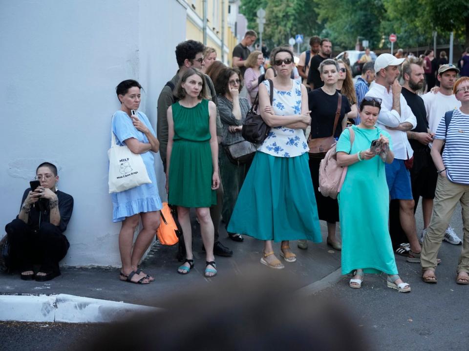 People stand in front of a Moscow court that sentenced Yevgenia Berkovich and Svetlana Petrichuk on July 8, 2024 (AP)