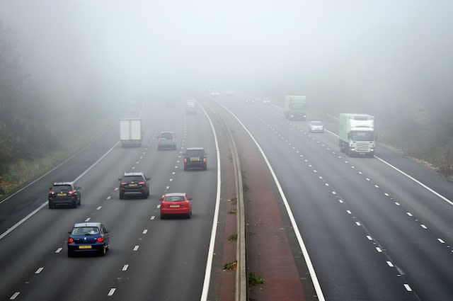 Traffic makes it's way through dense fog between junctions 5 and 6 of the M3 Motorway in Hampshire PRESS ASSOCIATION Photo. Picture date: Sunday November 1, 2015. See PA story WEATHER . Photo credit should read: Andrew Matthews/PA Wire