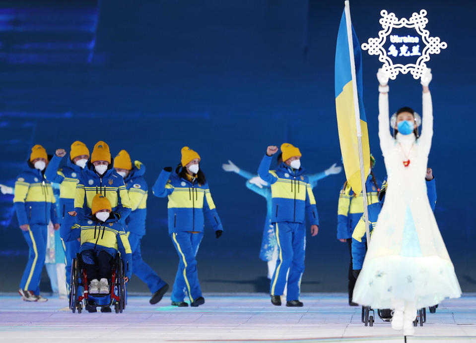 Members of Team Ukraine enter the stadium during the opening ceremony of the Beijing 2022 Winter Paralympics.  / Credit: Getty Images