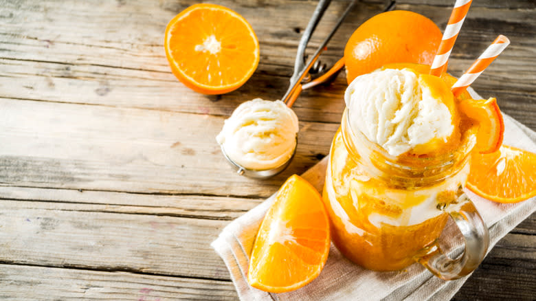 creamsicle ice cream in cup with straws