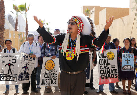 Representatives of different indigenous groups from various countries protest during the UN Climate Change Conference 2016 (COP22) in Marrakech, Morocco, November 17, 2016. REUTERS/Youssef Boudlal