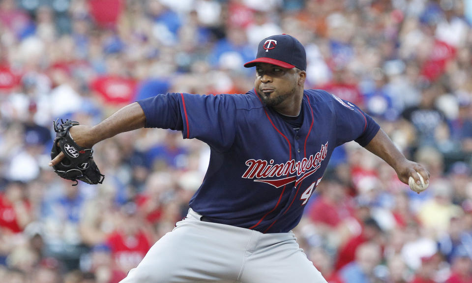 Minnesota Twins starting pitcher Francisco Liriano (47) throws during the first inning of a baseball game against the Texas Rangers, Friday, July 6, 2012, in Arlington, Texas. (AP Photo/LM Otero)