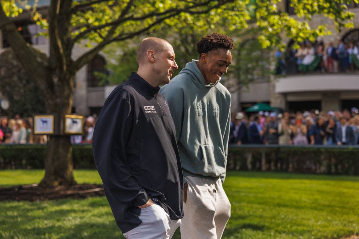 Kentucky men’s basketball head coach Mark Pope (left) walks around Keeneland Race Course in Lexington with college basketball player Amari Williams. Formerly a four-year player at Drexel, Williams will transfer to UK for the 2024-25 season.