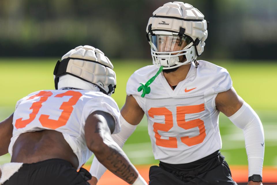 OSU defensive back Jason Taylor II (25) runs through drills at practice on Aug. 3 in Stillwater.