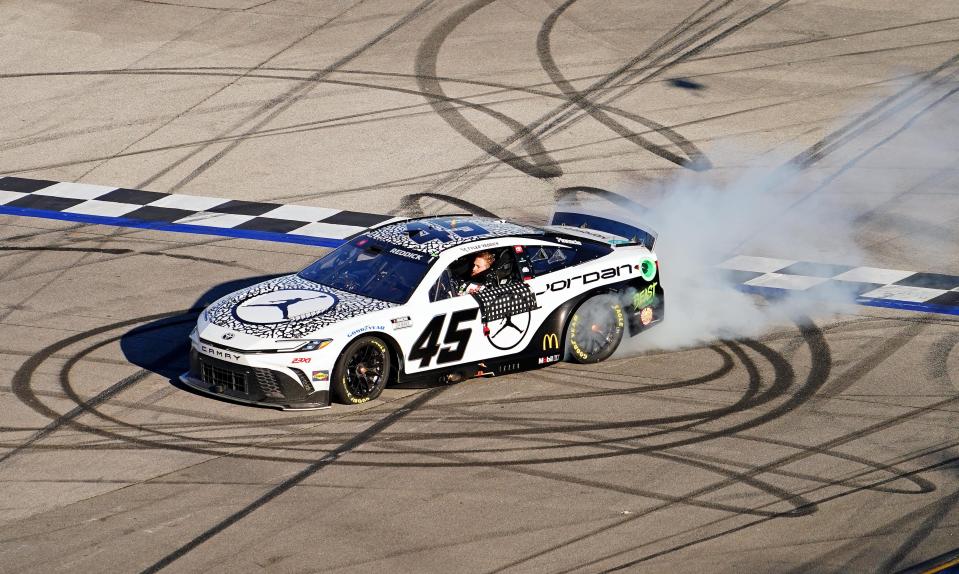 Apr 21, 2024; Talladega, Alabama, USA; NASCAR Cup Series driver Tyler Reddick (45) celebrates after winning the GEICO 500 at Talladega Superspeedway. Mandatory Credit: John David Mercer-USA TODAY Sports