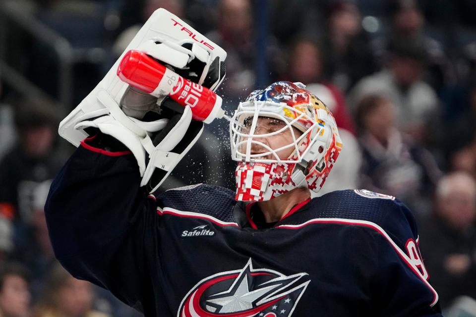 Oct 12, 2023; Columbus, Ohio, USA; Columbus Blue Jackets goaltender Elvis Merzlikins (90) cools off during a stoppage during the second period of the NHL hockey game against the Philadelphia Flyers at Nationwide Arena.