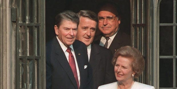 Economic summit leaders (from left) Ronald Reagan, Brian Mulroney and Helmut Kohl follow Margaret Thatcher into a courtyard at Hart House in Toronto, June 20, 1988.