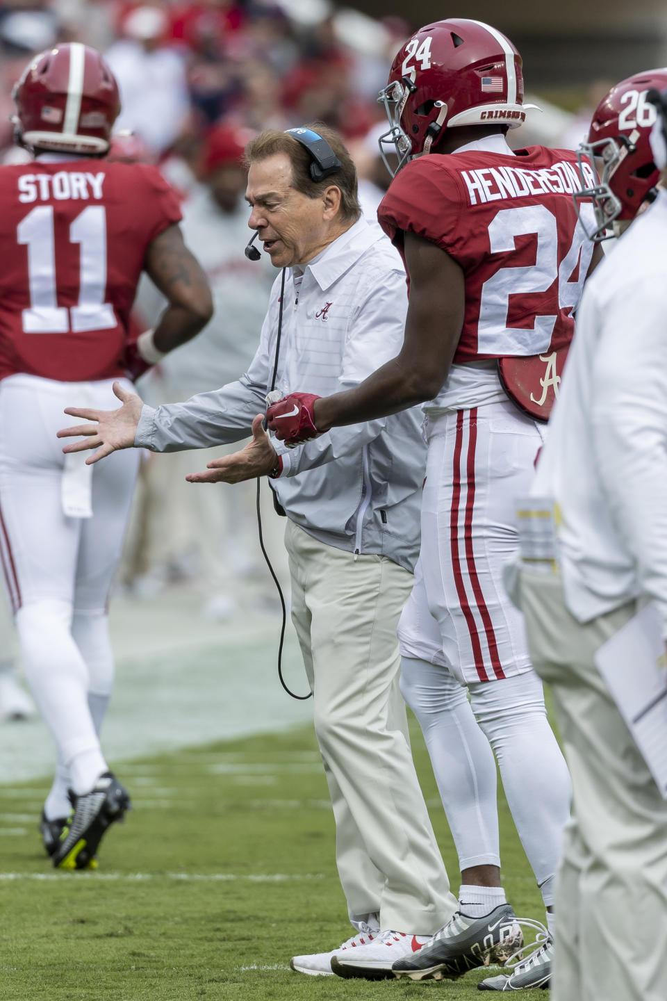 Alabama head coach Nick Saban takes issue with Alabama wide receiver/running back Emmanuel Henderson Jr. (24) after he left the end zone on a kickoff during the first half of an NCAA college football game against Austin Peay, Saturday, Nov. 19, 2022, in Tuscaloosa, Ala. (AP Photo/Vasha Hunt)