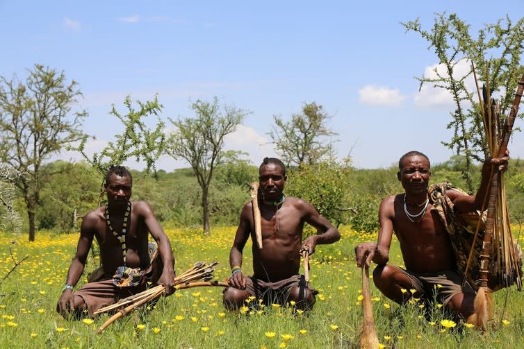 <span class="caption">Hadza hunters.</span> <span class="attribution"><span class="source">Jeff Leach</span>, <span class="license">Author provided</span></span>