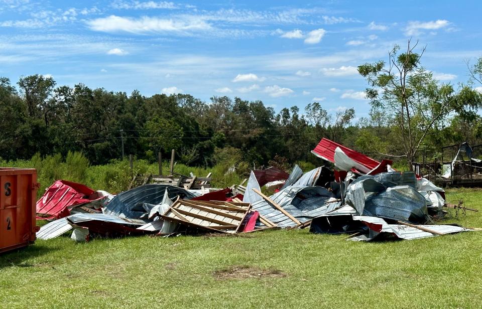 Hurricane Idalia heavily damaged and destroyed shelters and barns at Lyons Show Pigs, a 100-acre family farm in Lafayette County, Florida.