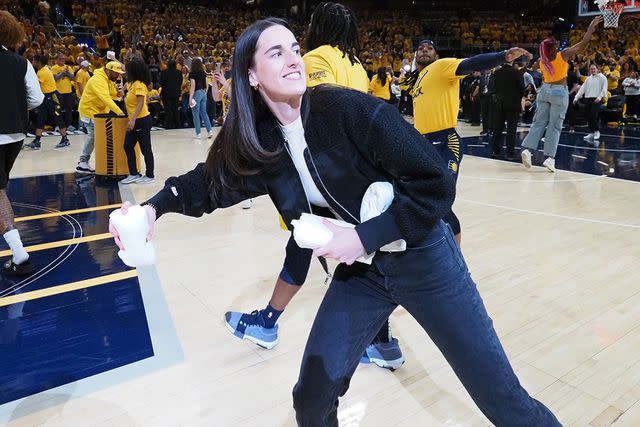 <p>Ron Hoskins/NBAE via Getty I</p> Caitlin Clark, Game 3 of the 2024 NBA Playoffs on April 26, 2024