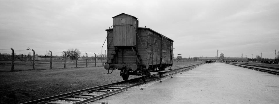 A wagon stands on the railway tracks from where hundred thousands of people were directed to the gas chambers to be murdered inside the former Nazi death camp of Auschwitz Birkenau or Auschwitz II, in Oswiecim, Poland, Sunday, Dec. 8, 2019. On Monday — 75 years after its liberation — hundreds of survivors from across the world will come back to visit Auschwitz for the official anniversary commemorations. (AP Photo/Markus Schreiber)