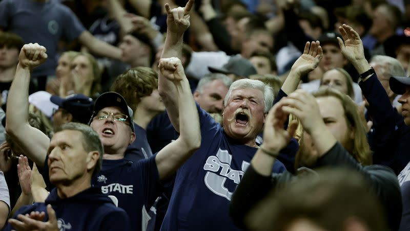 Utah State Aggies fans cheer as game against Boise State nears an end on Saturday, March 11, 2023. The Aggies are looking for to find a replacement for coach Ryan Odom who left for a job at VCU.
