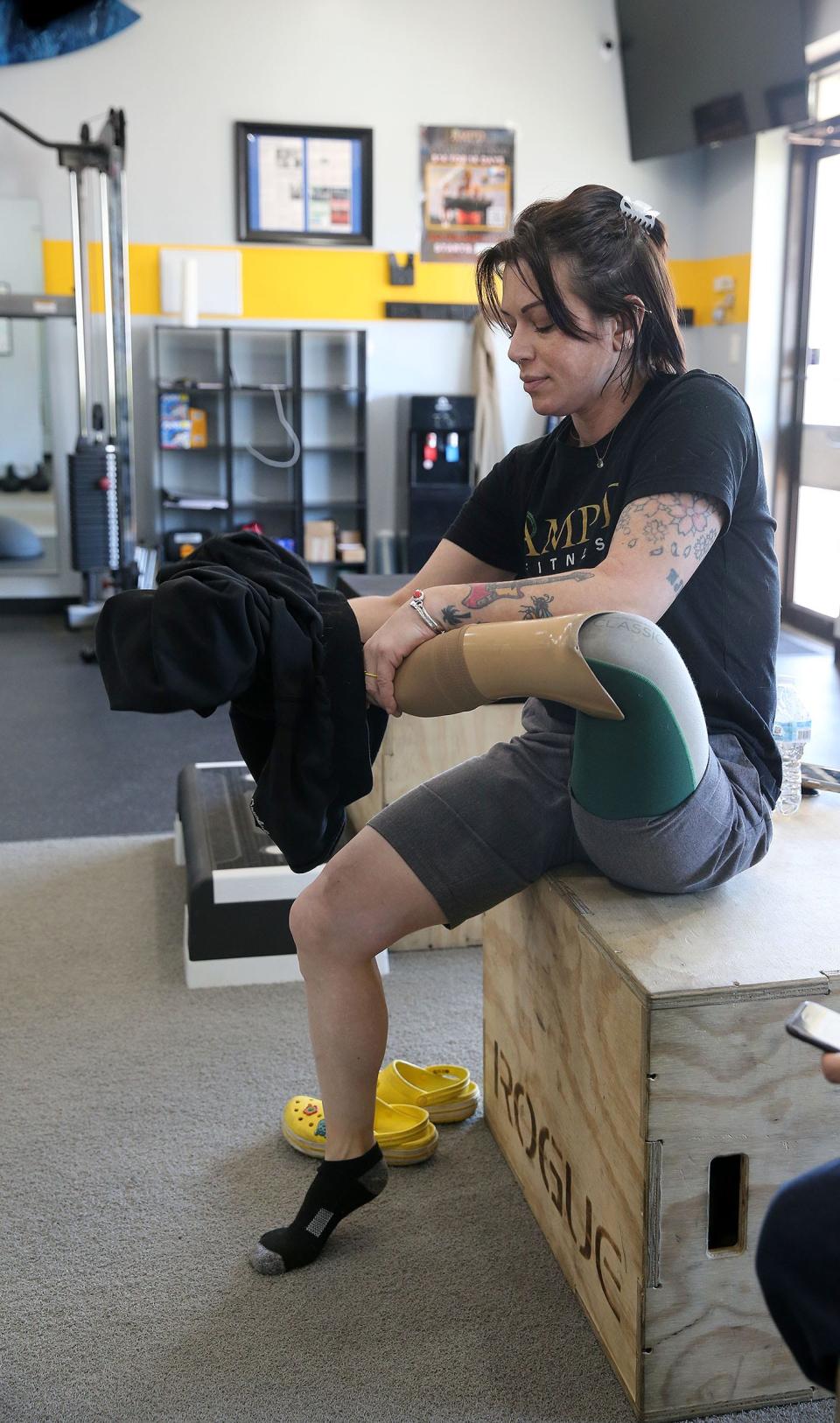 AmyMarie DeLuca is shown at AMP'D Fitness in Belmar Tuesday, March 19, 2024. She needs a new prosthetic leg and can't afford it through insurance. Members of the gym have banded together to raise money for it.