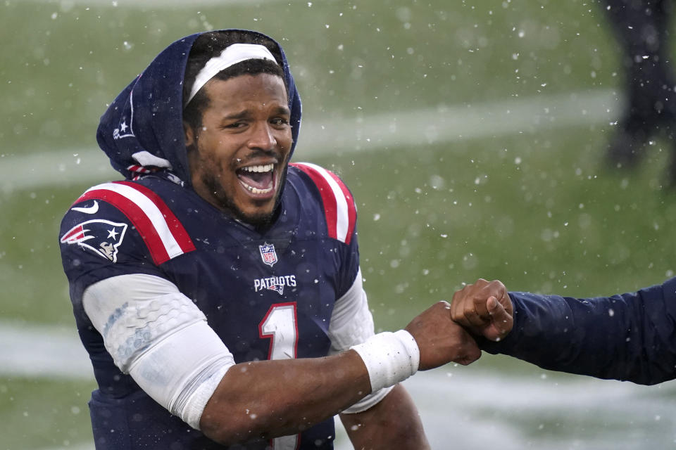 Newton walks off the field. 