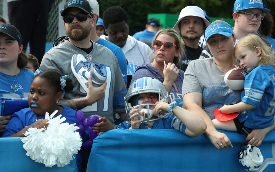 Lions fans wait for autographs after training camp on Wednesday, Aug. 02, 2023, in Allen Park.