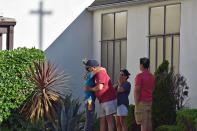 <p>A TraderJoe’s employee is comforted after a suspect barricaded inside the supermarket in Silverlake, Los Angeles, on July 21, 2018. – A suspect was barricaded inside a supermarket in the US city of Los Angeles on Saturday, police said, in what US media reported was a possible hostage situation. (Photo: Robyn Beck/AFP/Getty Images) </p>