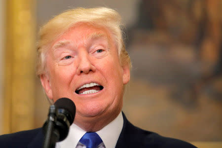 FILE PHOTO: U.S. President Donald Trump speaks during an announcement on immigration reform in the Roosevelt Room of the White House in Washington, U.S., August 2, 2017. REUTERS/Carlos Barria/File Photo