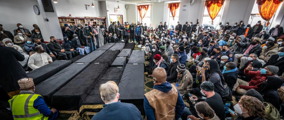 Coffins of 15 victims of a deadly January 9 Bronx apartment fire at the Islamic Cultural Center of the Bronx during a funeral services on Sunday January 16, 2022. / Credit: J. Conrad Williams Jr/Newsday RM via Getty Images