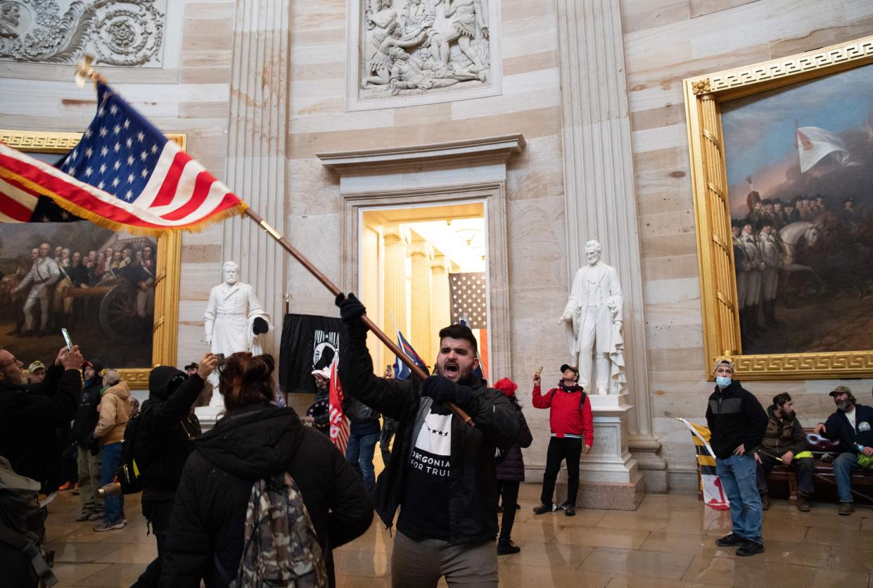 Supporters of US President Donald Trump protest inside the US Capitol on January 6, 2021, in Washington, DC.