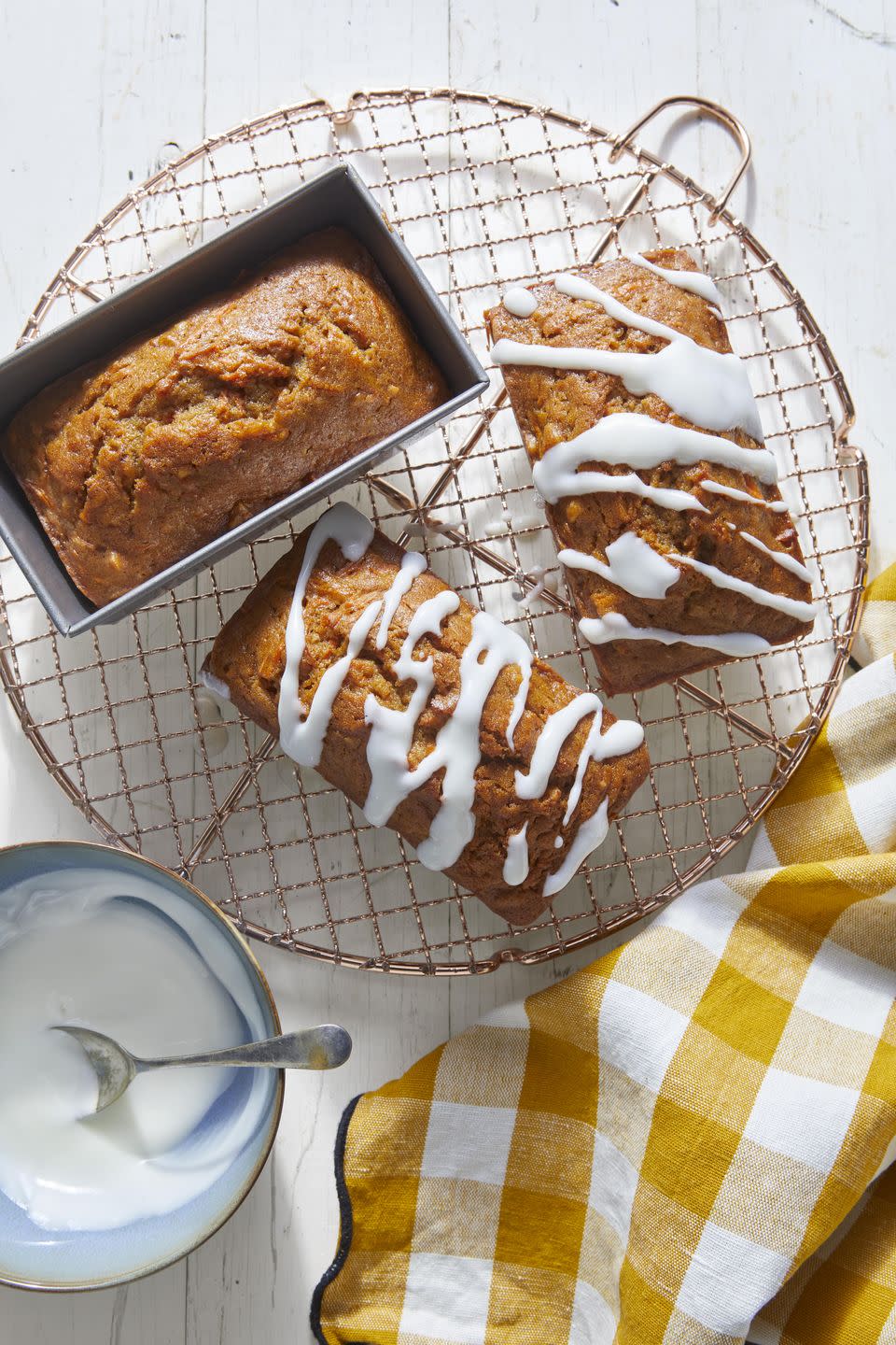 <p>Know any carrot cake lovers? Make this bread in mini pans and it's perfect for gifting. Or make it in one large pan for yourself.</p><p><strong><a href="https://www.countryliving.com/food-drinks/a34946865/carrot-nut-bread-with-sour-cream-glaze-recipe/" rel="nofollow noopener" target="_blank" data-ylk="slk:Get the recipe;elm:context_link;itc:0;sec:content-canvas" class="link ">Get the recipe</a>.</strong></p><p><a class="link " href="https://www.amazon.com/Chicago-Metallic-Commercial-Non-Stick-Mini/dp/B003YKGQVK/?tag=syn-yahoo-20&ascsubtag=%5Bartid%7C10050.g.35246097%5Bsrc%7Cyahoo-us" rel="nofollow noopener" target="_blank" data-ylk="slk:SHOP MINI LOAF PANS;elm:context_link;itc:0;sec:content-canvas">SHOP MINI LOAF PANS</a></p>