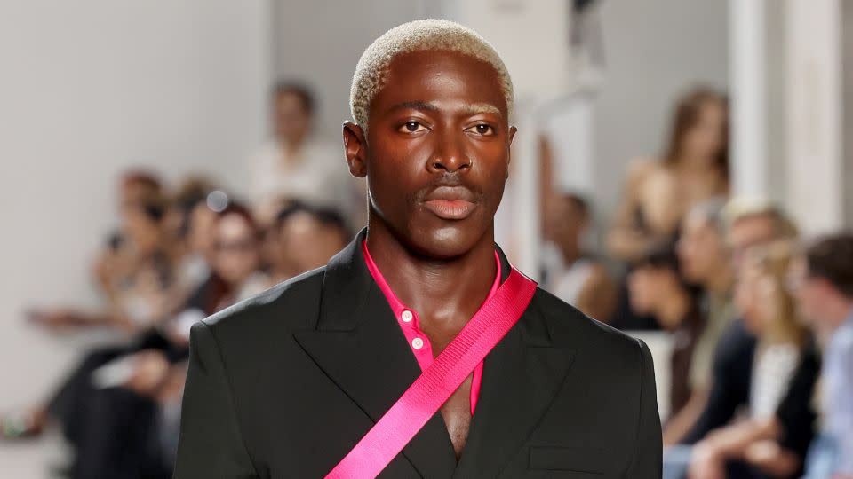 A look from Peter Do's debut for Helmut Lang, modeled by musician and actor Moses Sumney. Do referenced Lang's original utility straps, but as seatbelts instead of parachute harnesses. - Cindy Ord/Getty Images