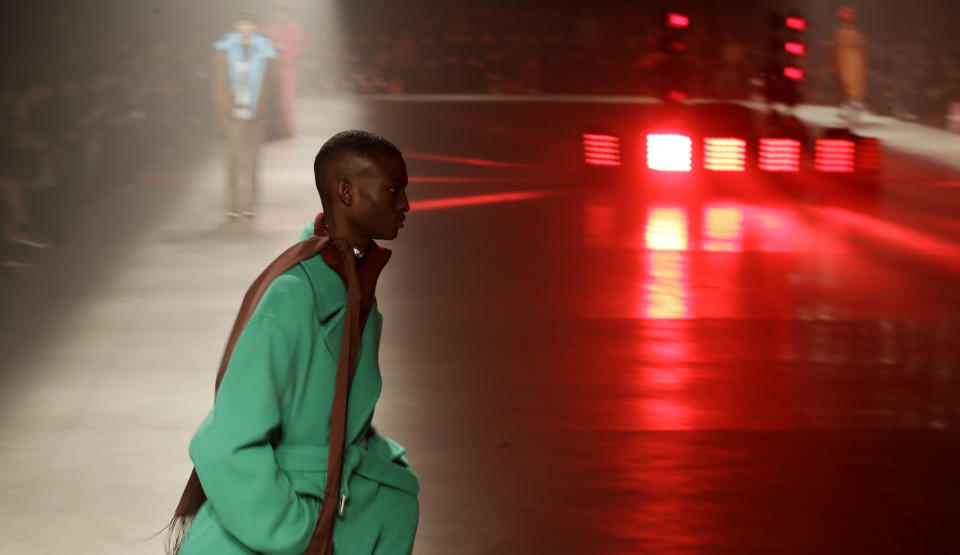 A model wears a creation part of the MSGM men's Fall-Winter 2020/21 collection, that was presented during the fashion week, in Milan, Italy, Sunday, Jan. 12, 2020. (AP Photo/Luca Bruno)