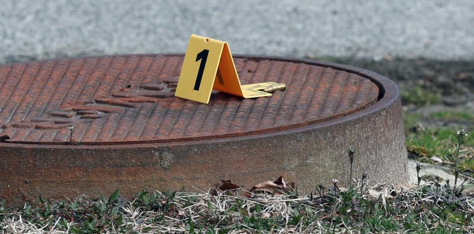 A shell casing is marked as evidence as Massachusetts State Police investigate a fatal shooting at 36 Hoover Ave. in Brockton on Easter Sunday, March 31, 2024.