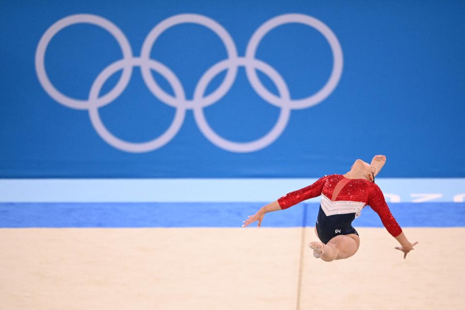 USA's Sunisa Lee competes during the floor event of the artistic gymnastics women's team final during the Tokyo 2020 Olympic Games at the Ariake Gymnastics Centre in Tokyo on July 27, 2021. (Photo by Martin BUREAU / AFP) (Photo by MARTIN BUREAU/AFP via Getty Images)