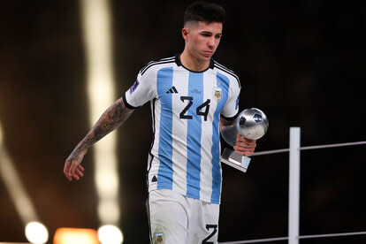 Enzo Fernandez of Argentina with the Trophy best young player the FIFA World Cup Qatar 2022 Final match between Argentina and France at Lusail Stadium