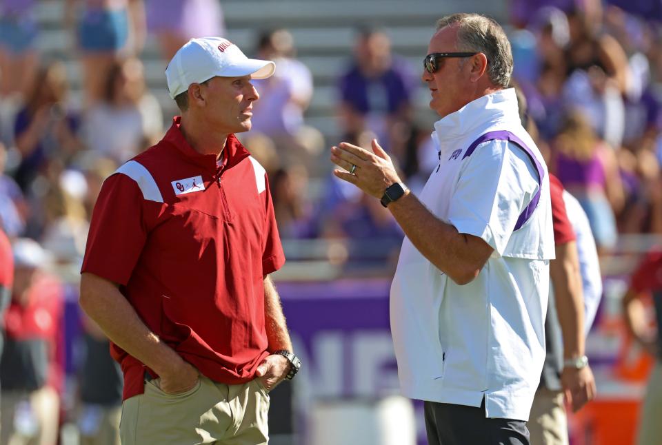 Oct 1, 2022; Fort Worth, Texas, USA;  Oklahoma Sooners head coach Brent Venables speaks with TCU Horned Frogs head coach Sonny Dykes before the game at Amon G. Carter Stadium. Mandatory Credit: Kevin Jairaj-USA TODAY Sports