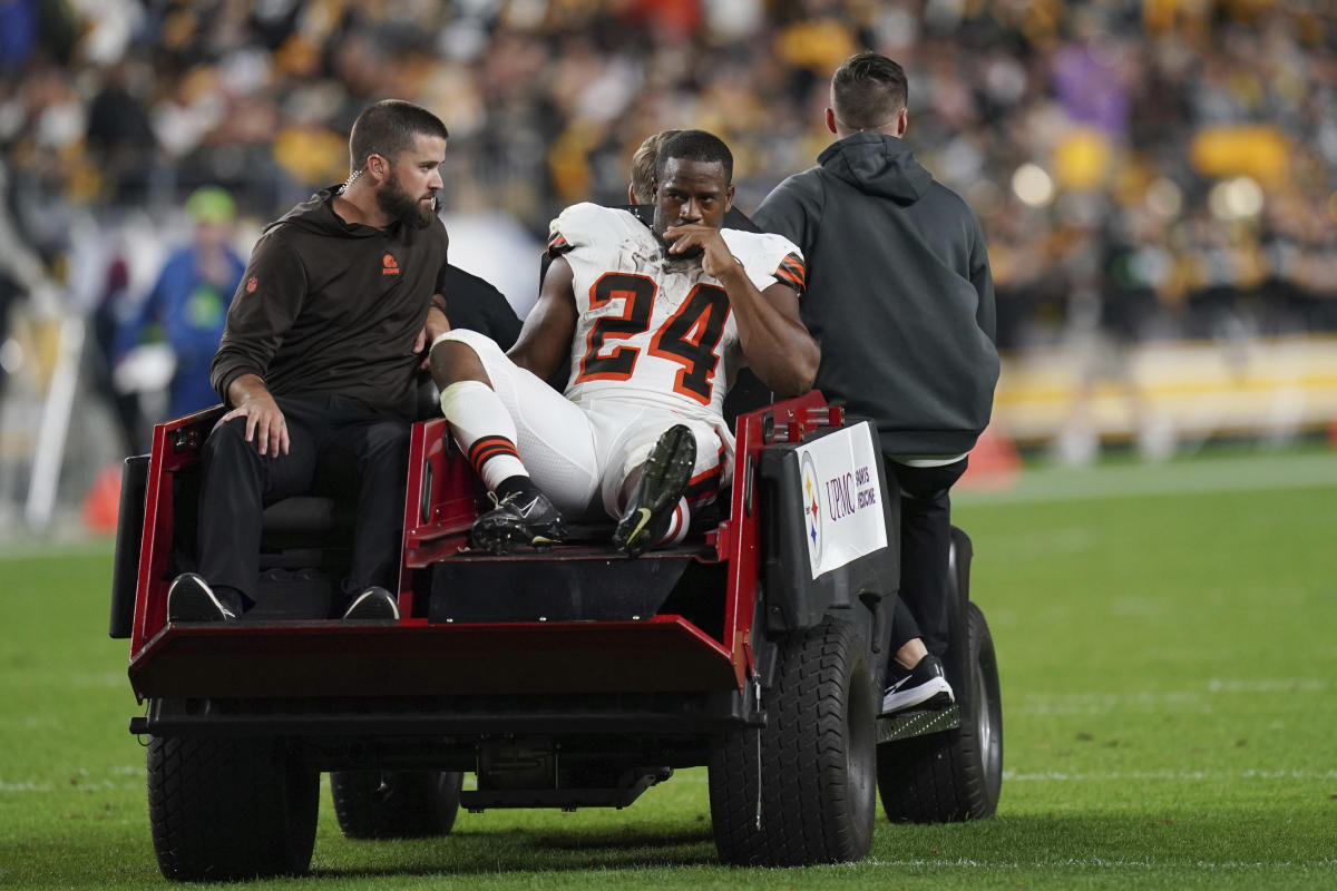 Bulldogs in the NFL - Image 34: Cleveland Browns running back Nick Chubb  (left) and his cousin Denver Broncos outside linebacker Bradley Chubb  (right) exchange jerseys following the game at Broncos Stadium