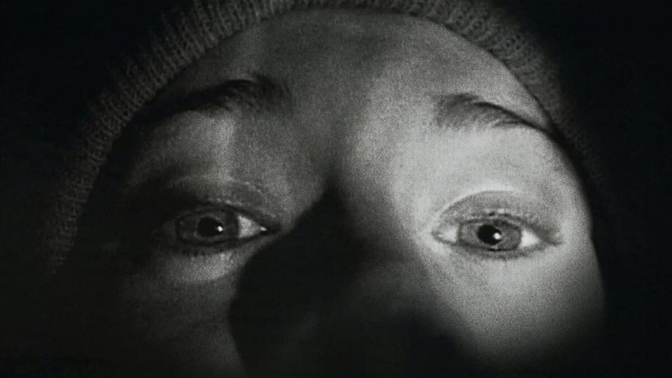 The blair witch project film lo-fi horror black and white picture of a man's eyes