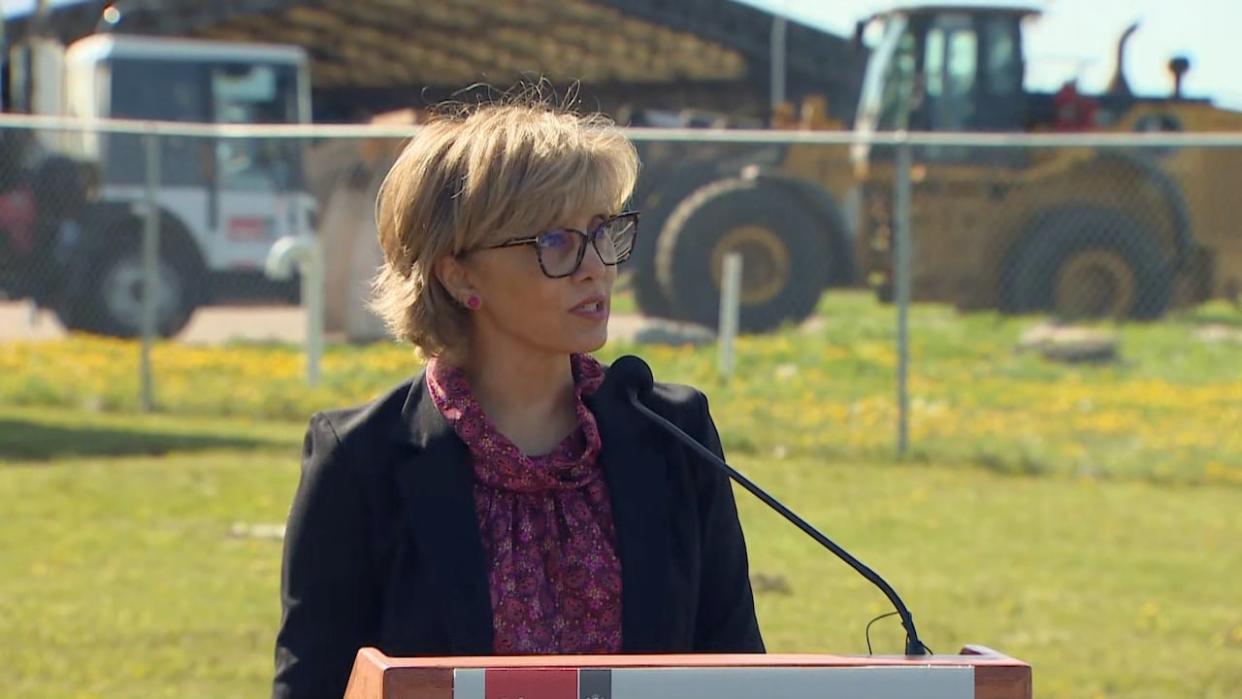 Calgary Mayor Jyoti Gondek speaks at the groundbreaking for Calgary's composting facility expansion, which will include new technology allowing the operation to reduce greenhouse gas emissions.  (Mike Symington/CBC - image credit)