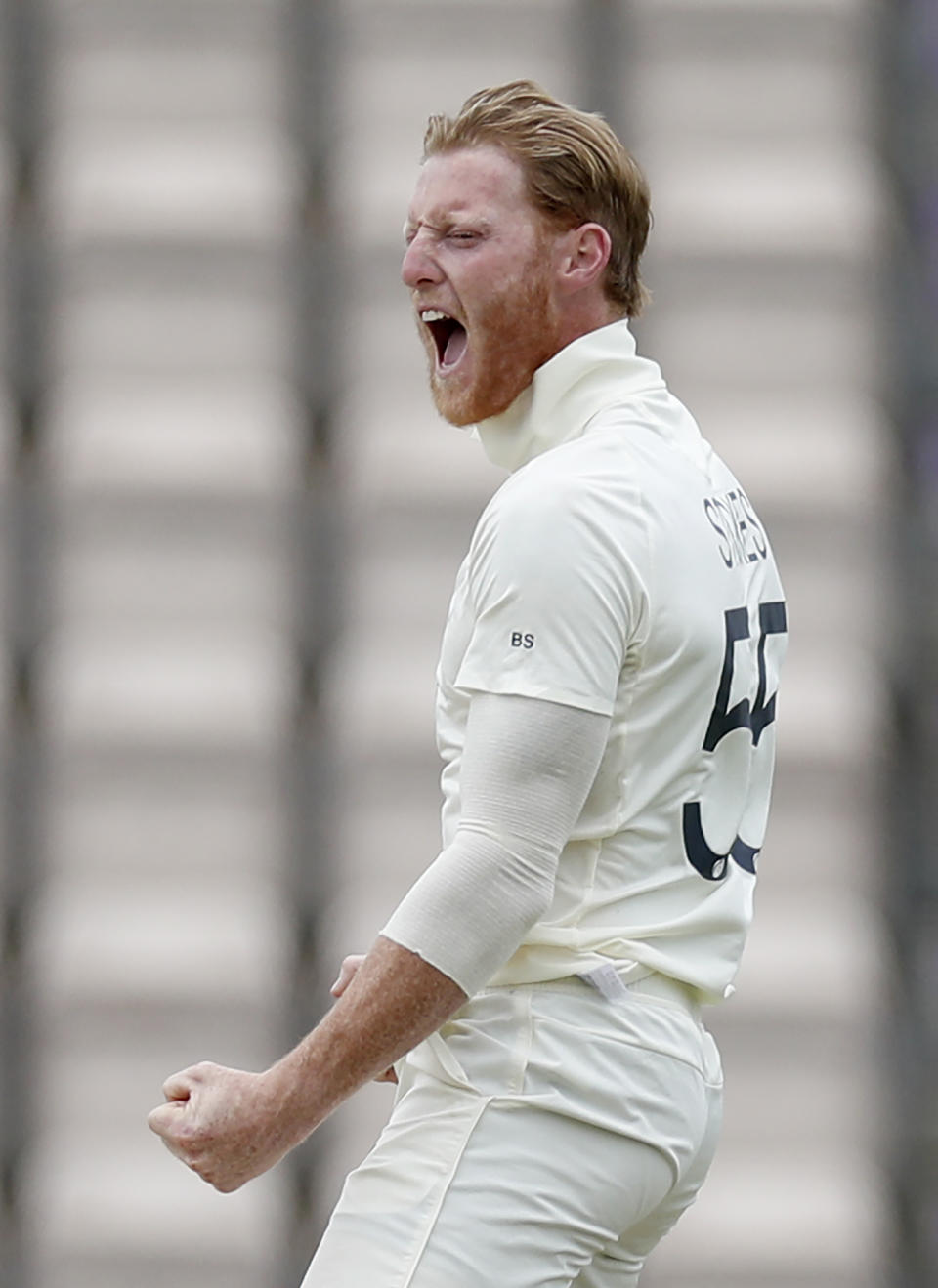 England captain Ben Stokes celebrates the dismissal of West Indies' Kraigg Brathwaite during the third day of the first cricket Test match between England and West Indies, at the Ageas Bowl in Southampton, England, Friday, July 10, 2020. (Adrian Dennis/Pool via AP)