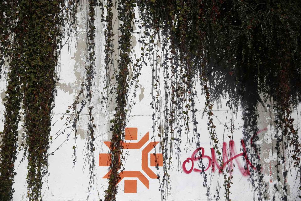 The Olympic snowflake logo is seen on the wall of the Kosevo stadium, the venue of the opening ceremony for the 1984 Winter Olympics in Sarajevo