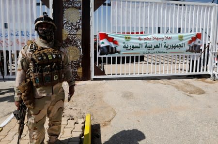 Iraqi soldier is seen at the Iraqi-Syrian border, in Al Qaim