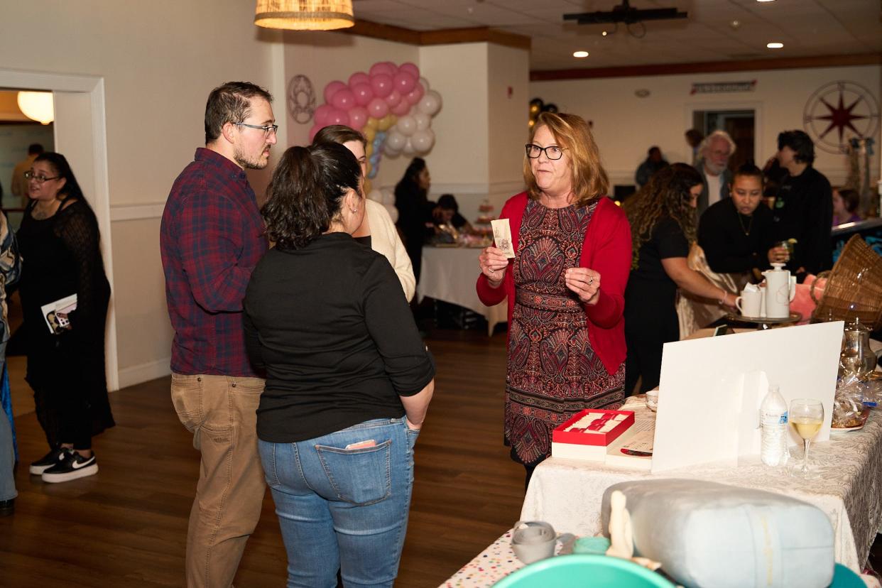 Julie Lizotte, right, owner of Milward Tea House talks about her businesses.