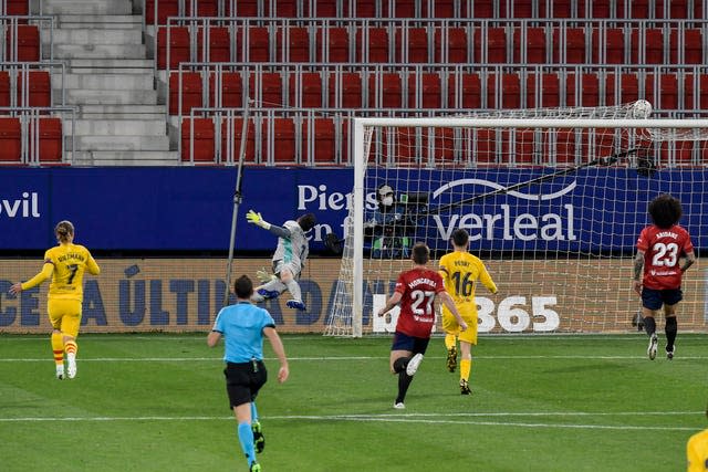 Barcelona’s Jordi Alba scores against Osasuna