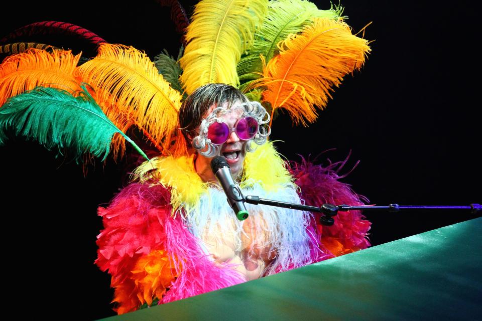 Rus Anderson, in a 1974-era ostrich jumpsuit, performs as Elton John in &quot;Rocket Man,&quot; which comes to Vero Beach on Feb. 9.