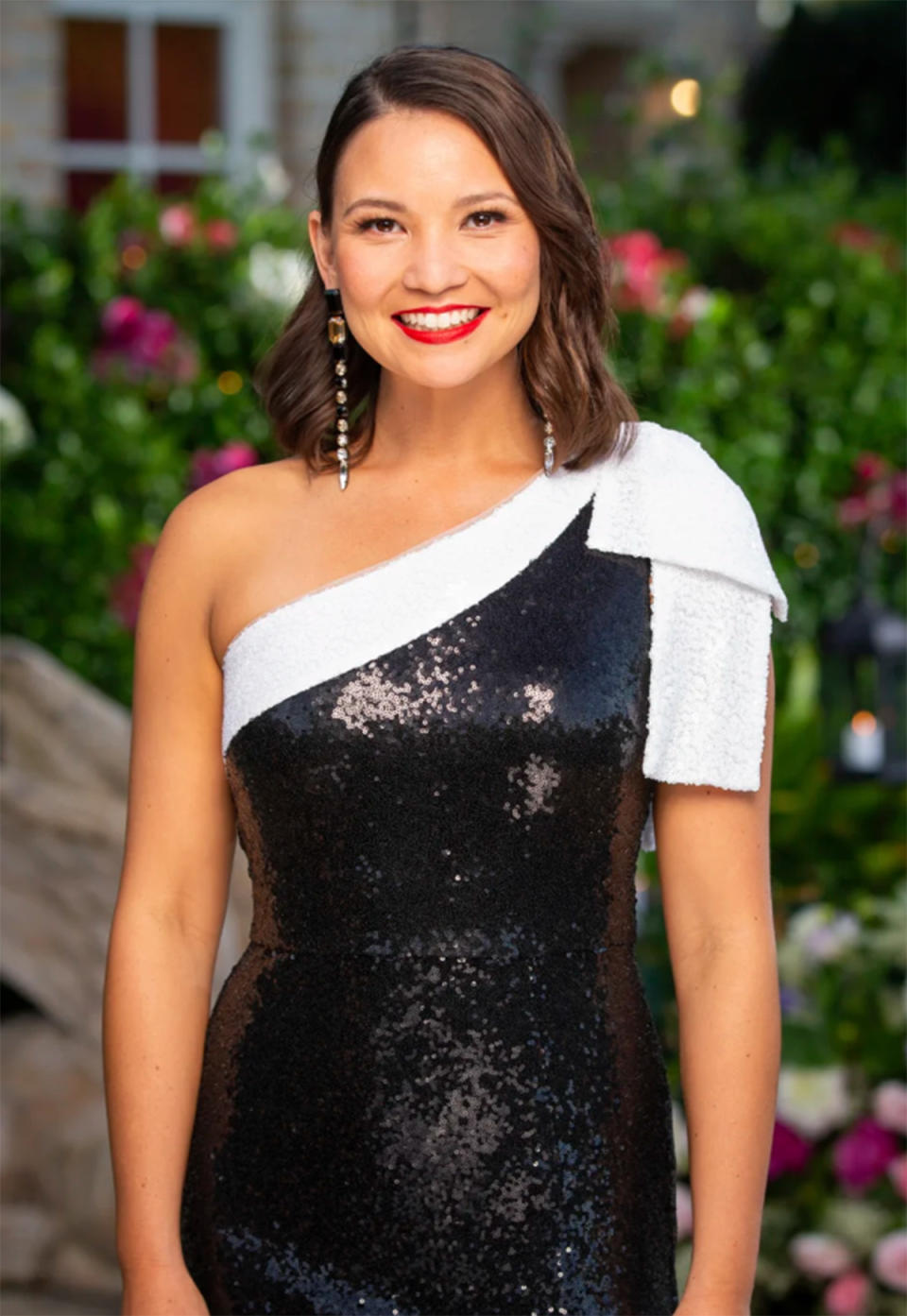 The Bachelor Australia 2021 contestant Chanel Tang, 34, Flight Manager wearing a black sequin one-shoulder dress