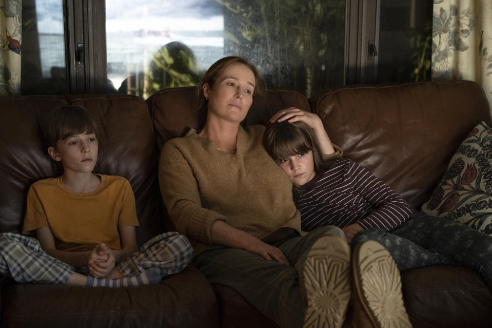 This image released by Universal Pictures shows Wesley Holloway, from left, Jennifer Ehle and Justine Colan in a scene from "She Said." (JoJo Whilden/Universal Pictures via AP)