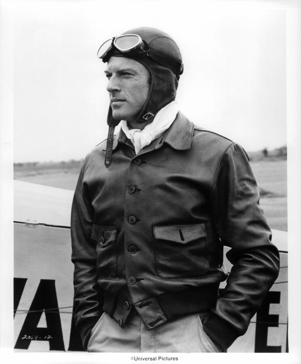 <p>Robert Redford wears a pilot outfit for a scene in <em>The Great Waldo Pepper </em>in 1975. </p>