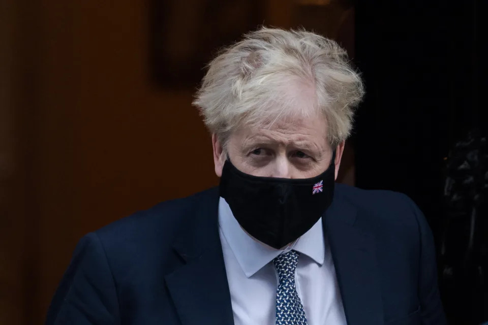 LONDON, UNITED KINGDOM - JANUARY 12, 2022: British Prime Minister Boris Johnson leaves 10 Downing Street for PMQs at the House of Commons on January 12, 2022 in London, England. Boris Johnson is facing pressure over alleged gathering of No 10 staff in Downing Street garden on 20 May 2020 at a time when strict Covid-19 lockdown measures were in place. (Photo credit should read Wiktor Szymanowicz/Future Publishing via Getty Images)